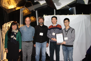 Phoebe Chen, Laurent Amsaleg and Shin’ichi Satoh (left) present the Best Paper Award to Yu Liu and Yanming Guo (right).